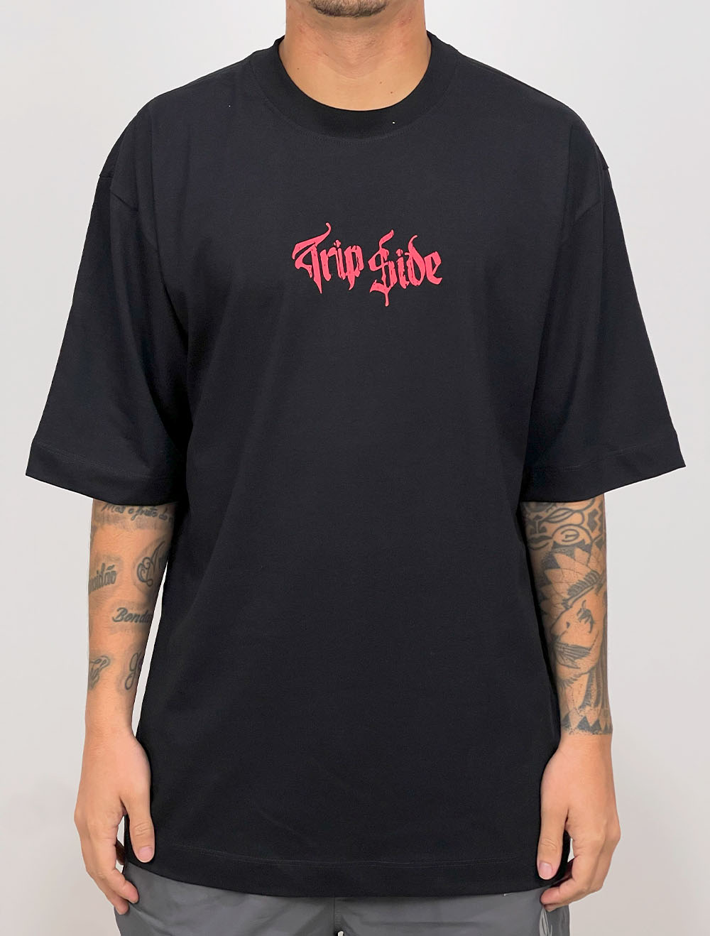 Camiseta Oversized Trip Side Tag Poosie Santa