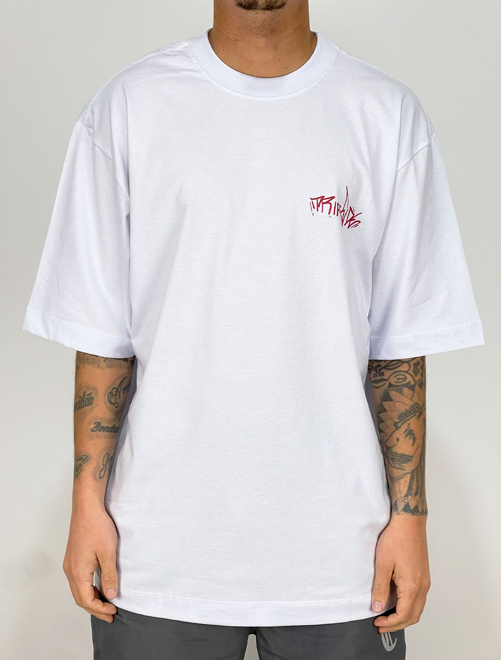 Camiseta Oversized Trip Side Tag Poosie Santa