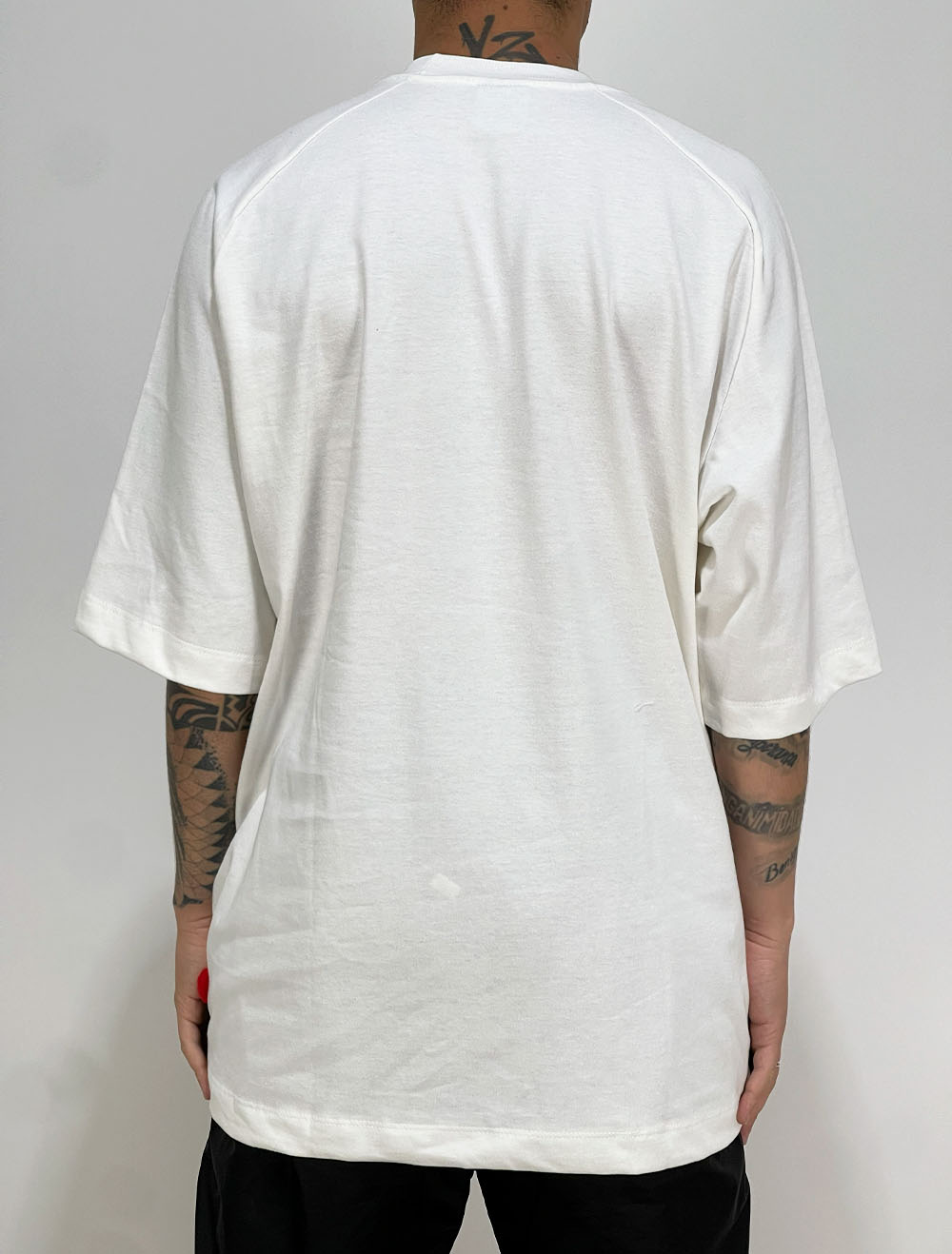 Camiseta Oversized Premium Raglan Trip Side Tag Code